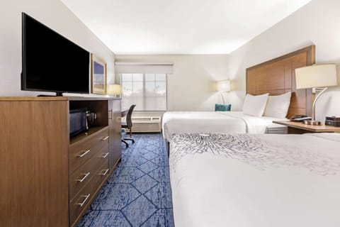 Deluxe Room, 2 Queen Beds, Non Smoking | Premium bedding, in-room safe, desk, blackout drapes