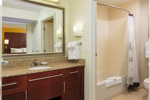 Suite, 1 King Bed with Sofa bed, Corner (Fireplace) | Bathroom | Free toiletries, hair dryer, towels