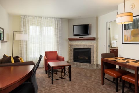 Suite, 1 King Bed with Sofa bed, Corner (Fireplace) | In-room safe, desk, iron/ironing board, free cribs/infant beds