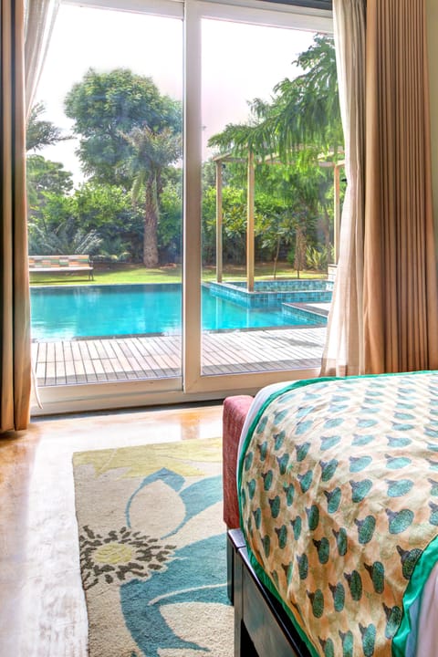 Luxury Room, Pool View | In-room safe, desk, blackout drapes, soundproofing