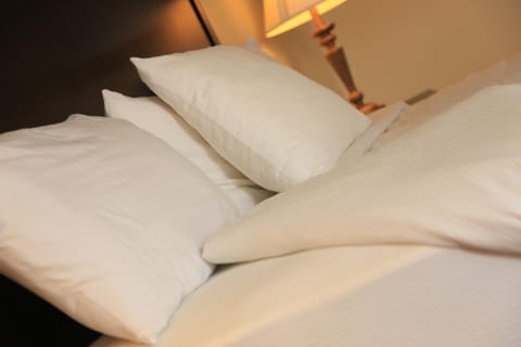 Frette Italian sheets, premium bedding, pillowtop beds, in-room safe