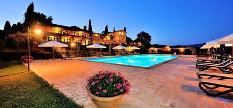 Seasonal outdoor pool, open 10:00 AM to 7:00 PM, pool umbrellas