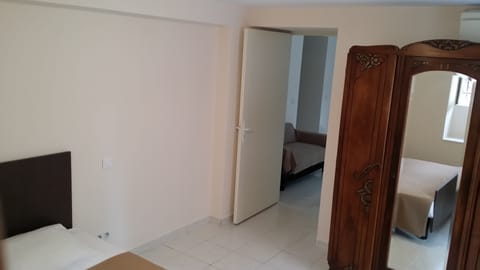 Family Apartment | Desk, blackout drapes, rollaway beds, free WiFi