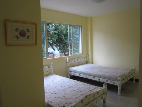 AC Room | Desk, bed sheets