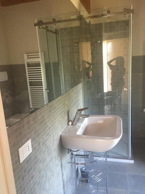 Shower, eco-friendly toiletries, hair dryer, bidet