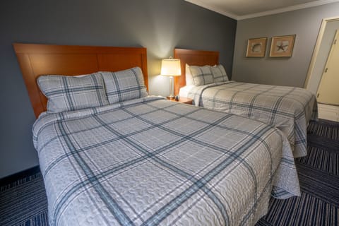 Deluxe Room, 2 Queen Beds, Courtyard View | Premium bedding, pillowtop beds, in-room safe, desk