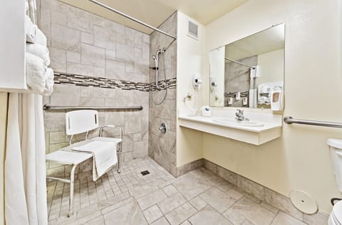 Double Queen ADA- Roll In | Bathroom | Combined shower/tub, deep soaking tub, free toiletries, hair dryer