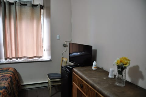 Standard Room, 2 Double Beds | Iron/ironing board, rollaway beds, free WiFi