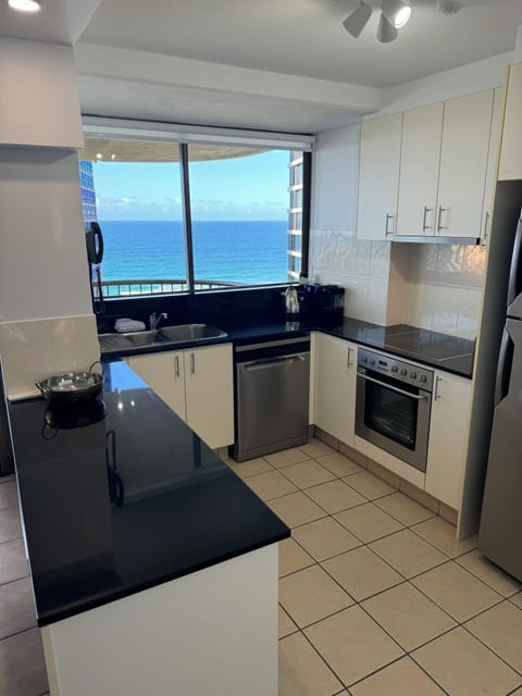 Deluxe Apartment, 3 Bedrooms, Beach View | Private kitchen | Full-size fridge, microwave, stovetop, dishwasher