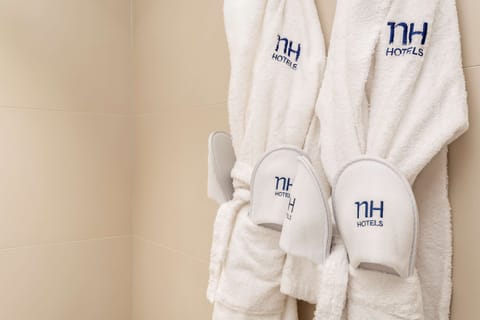 Eco-friendly toiletries, hair dryer, towels