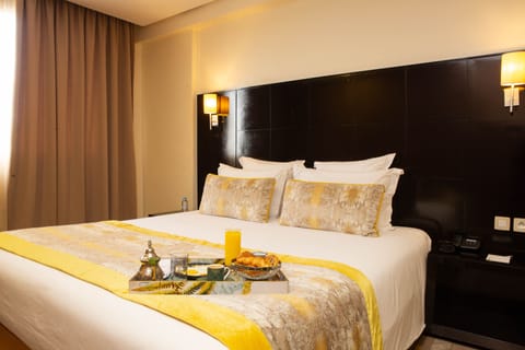 Deluxe Suite, 1 Queen Bed with Sofa bed | In-room safe, desk, laptop workspace, soundproofing