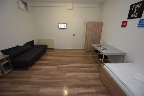 Apartment, 3 Bedrooms (20-00) | Living area | TV