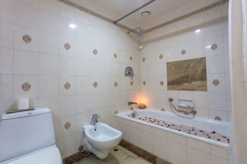 Suite | Bathroom | Separate tub and shower, free toiletries, hair dryer, bathrobes