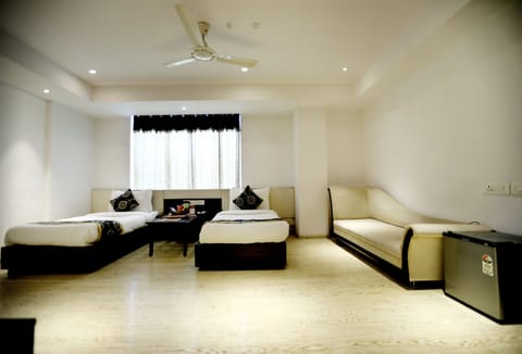 Grand Double or Twin Room, 1 Queen Bed, Refrigerator, City View | 20 bedrooms, in-room safe, soundproofing, iron/ironing board