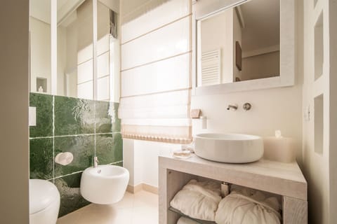 Luxury Suite, City View (Suite BORGO) | Bathroom | Shower, rainfall showerhead, designer toiletries, hair dryer