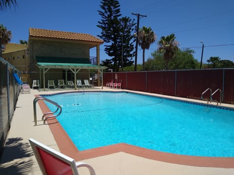 Outdoor pool, open 10 AM to 9:00 PM, sun loungers