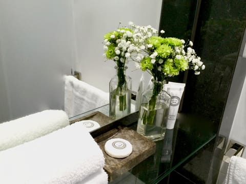 Studio Apartment | Bathroom | Shower, designer toiletries, hair dryer, towels