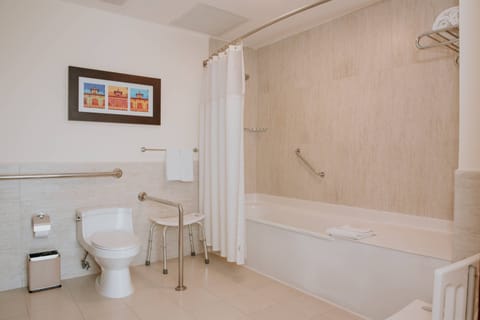 Standard Room, 1 King Bed | Bathroom | Combined shower/tub, hydromassage showerhead, free toiletries