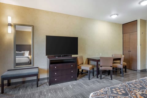 Suite, 2 Queen Beds, Non Smoking, Refrigerator & Microwave | Desk, laptop workspace, iron/ironing board, rollaway beds