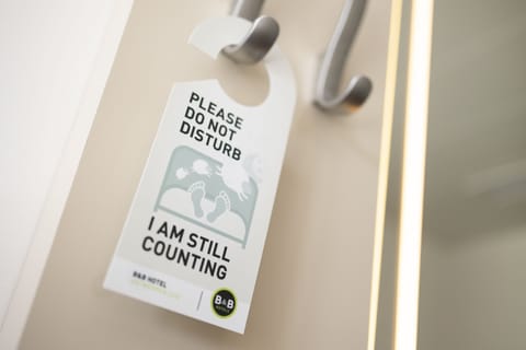 Desk, blackout drapes, soundproofing, free cribs/infant beds