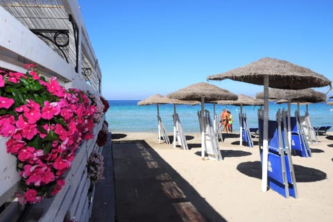 Private beach nearby, sun loungers, beach umbrellas, beach bar