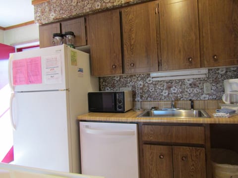 Condo, 2 Bedrooms | Private kitchen | Fridge, microwave, coffee/tea maker, cookware/dishes/utensils