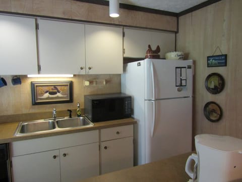 Condo, 2 Bedrooms | Private kitchen | Fridge, microwave, coffee/tea maker, cookware/dishes/utensils