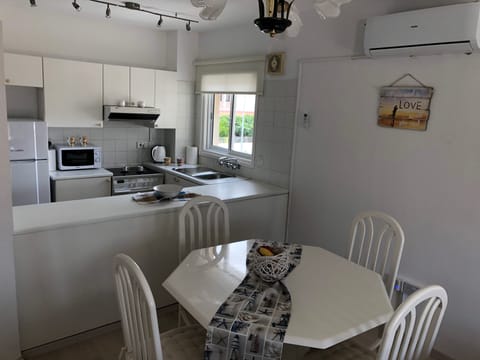 Apartment, 2 Bedrooms, Sea View | Private kitchen | Fridge, microwave, oven, stovetop