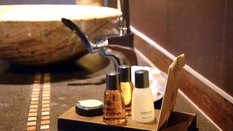 Luxury Suite, Terrace (Africaine) | Bathroom | Shower, hair dryer, bathrobes, towels