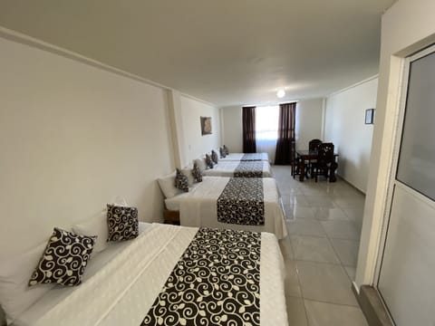 Basic Quadruple Room | Iron/ironing board, free WiFi, bed sheets