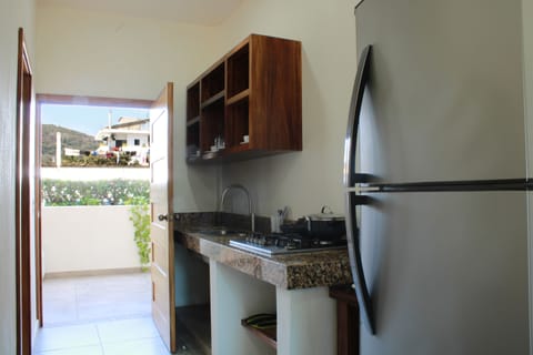 Basic Studio, 2 Double Beds | Private kitchen | Full-size fridge, microwave, stovetop, rice cooker