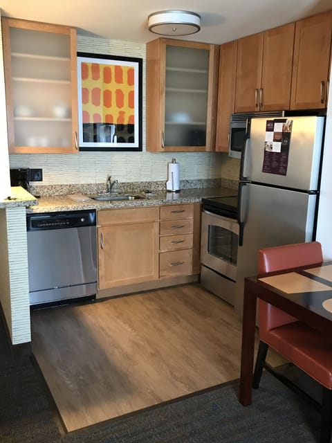 Suite, 1 Bedroom | Private kitchen | Full-size fridge, microwave, stovetop, dishwasher