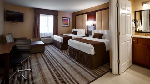 Hypo-allergenic bedding, pillowtop beds, desk, laptop workspace
