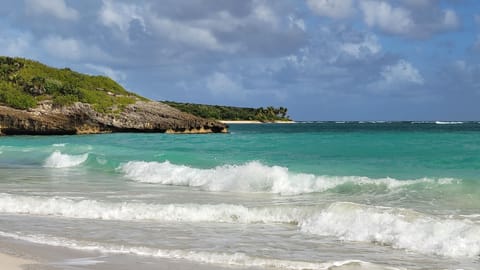 Beach nearby, white sand, beach towels