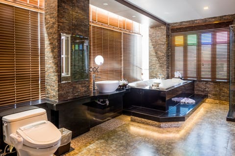 Nipa Grand Suite Room | Bathroom | Combined shower/tub, rainfall showerhead, free toiletries, hair dryer