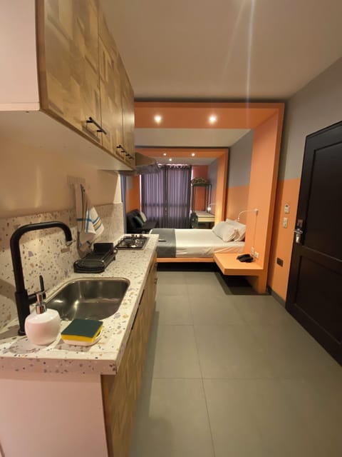 Comfort Room | Private kitchen | Mini-fridge, dining tables