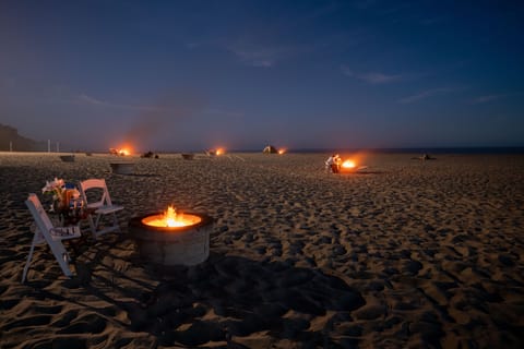 On the beach, free beach shuttle, beach towels, beach volleyball