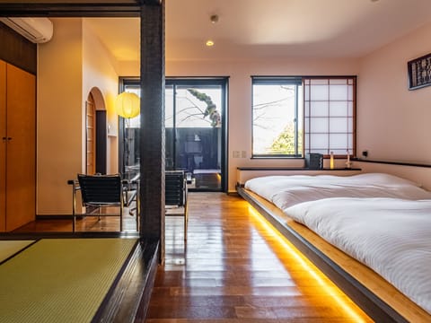 Japanese-Western Double or Twin Room 35 Sqm, Non Smoking(Guest room with open-air bath) | In-room safe, desk, laptop workspace, blackout drapes