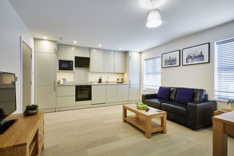 Apartment, 1 Bedroom | Living room | Flat-screen TV