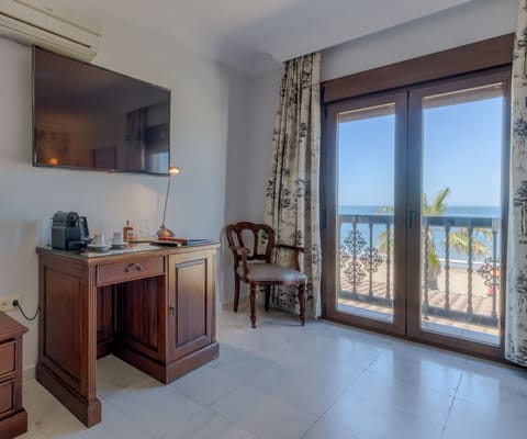 Double or Twin Room, Ensuite, Sea View | Minibar, in-room safe, desk, soundproofing