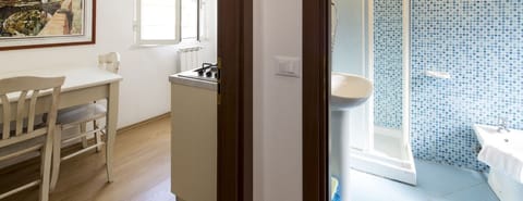 Apartment, 1 Bedroom | Minibar, in-room safe, desk, Internet
