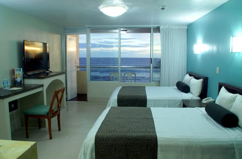 Standard Room, Ocean View | In-room safe, blackout drapes, free WiFi, bed sheets