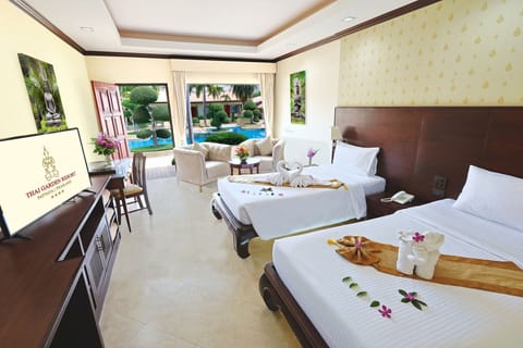 Deluxe Twin Room, Poolside | In-room safe, individually decorated, individually furnished, desk