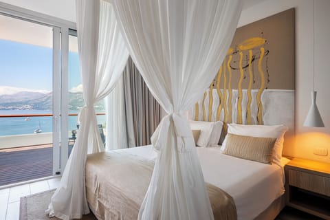 Junior Suite, Balcony, Sea View | In-room safe, desk, blackout drapes, free WiFi