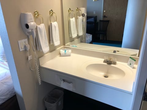 Deluxe Room, 2 Queen Beds, Refrigerator | Bathroom | Free toiletries