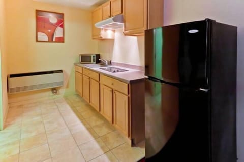 Room, 2 Queen Beds, Smoking | Private kitchenette | Fridge, microwave