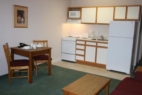 Fridge, microwave, coffee/tea maker, dining tables