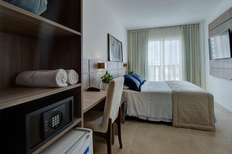 Deluxe Double Room, Sea View | Minibar, in-room safe, desk, blackout drapes