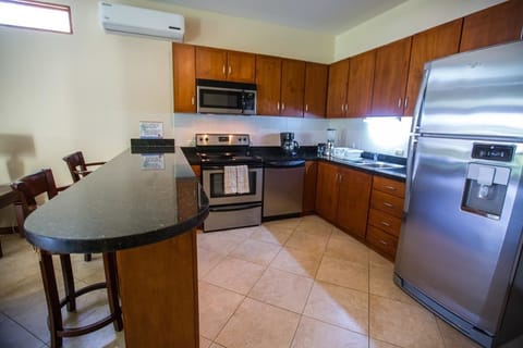 Family Villa, Multiple Beds, Kitchen, Ground Floor | Private kitchen | Full-size fridge, microwave, oven, stovetop