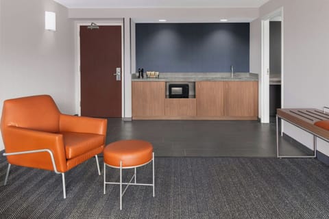 Pillowtop beds, desk, blackout drapes, iron/ironing board